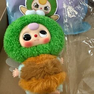 Plush Green and Brown Action Figure